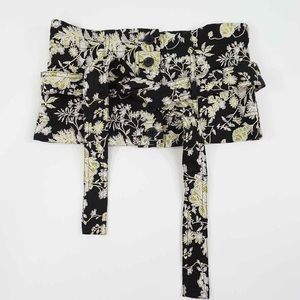 Chinese silk pattern waist belt with button closure, and tie feature.